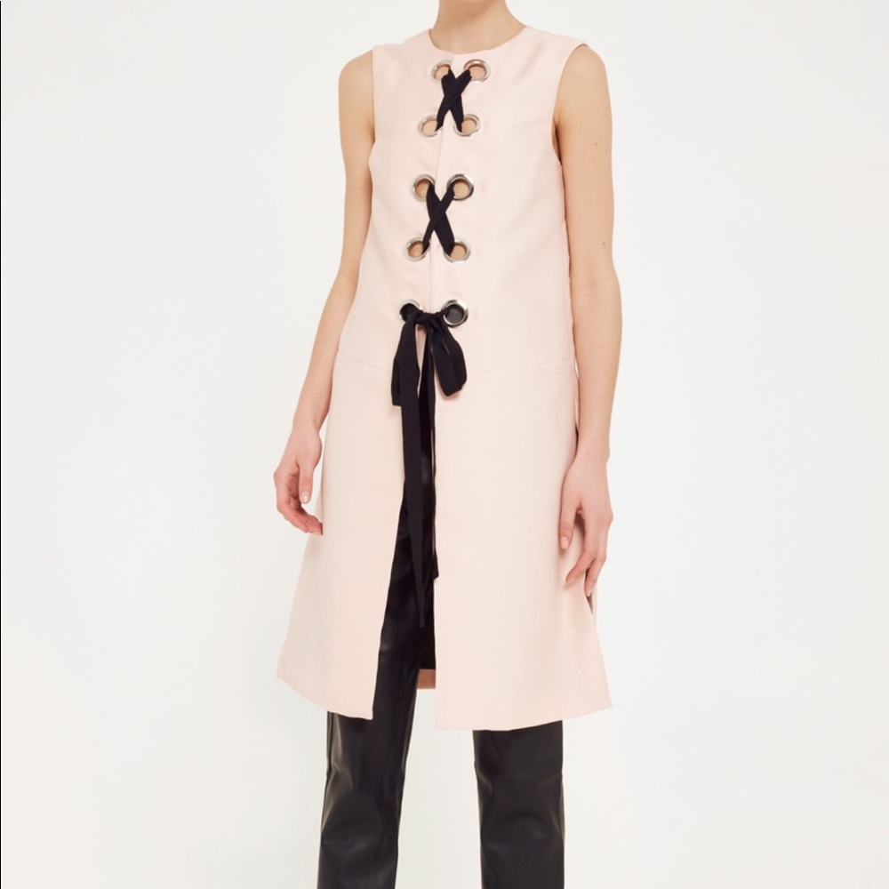 Lace up sleeveless jacket